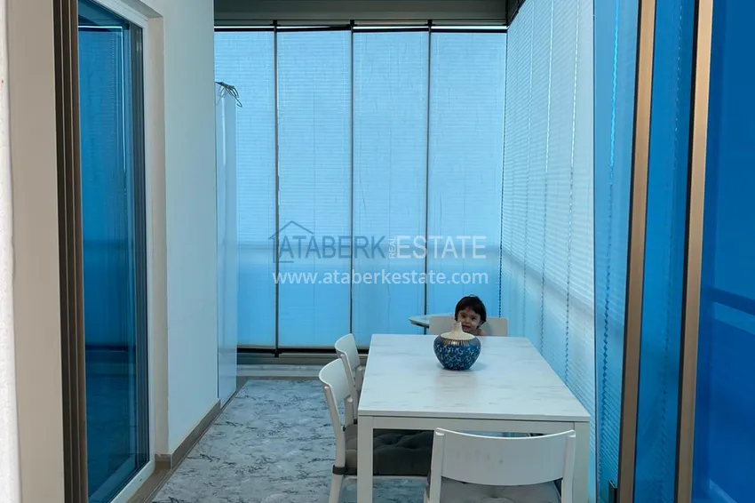 Приобрести Квартира в Махмутларе меблированная с застекленным балконом и открытым видом на море 5 