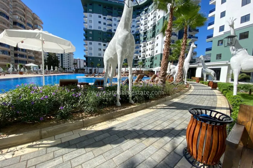 Квартиры в Махмутларе двухкомнатные полностью меблированные  7 