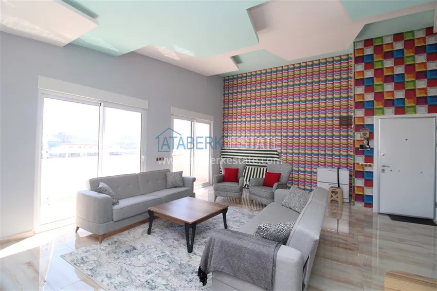 Приобрести Пентхаус в Махмутларе с мебелью, сауной и видом на море и горы 5