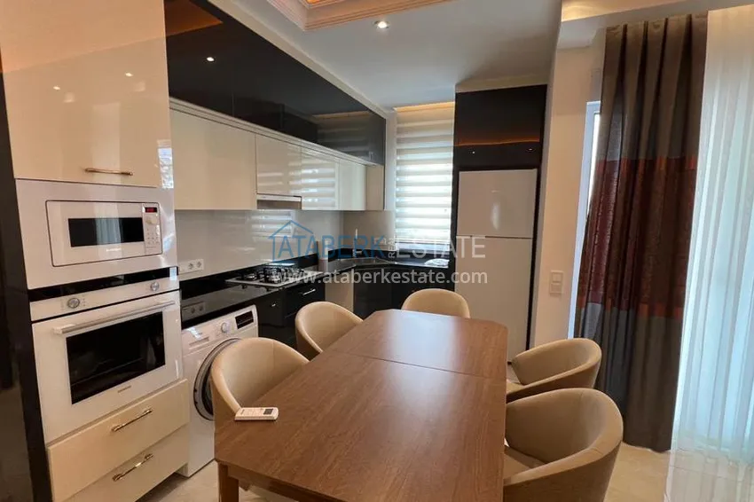 Приобрести Квартира в Махмутларе с новой мебелью и видом на горы в комплексе с отельной инфраструктурой 5 