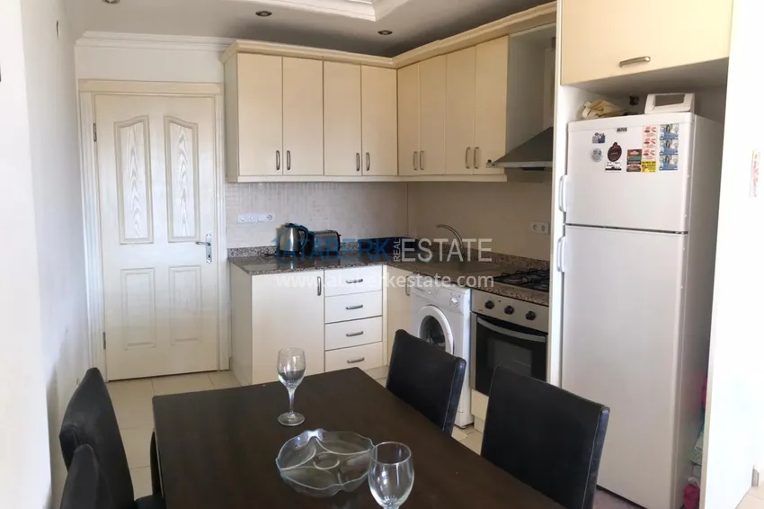 Приобрести Квартира в районе Оба с мебелью и панорамным видом в комфортабельном комплексе 8 