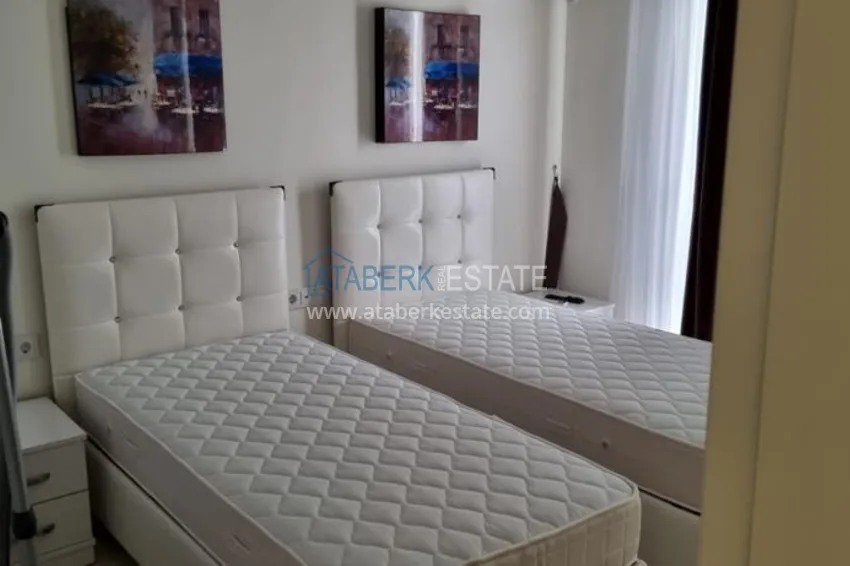 Приобрести Квартира в Махмутларе в благоустроенном жилом комплексе полностью готовая для проживанияи с мебелью с видом на море и горы 6 