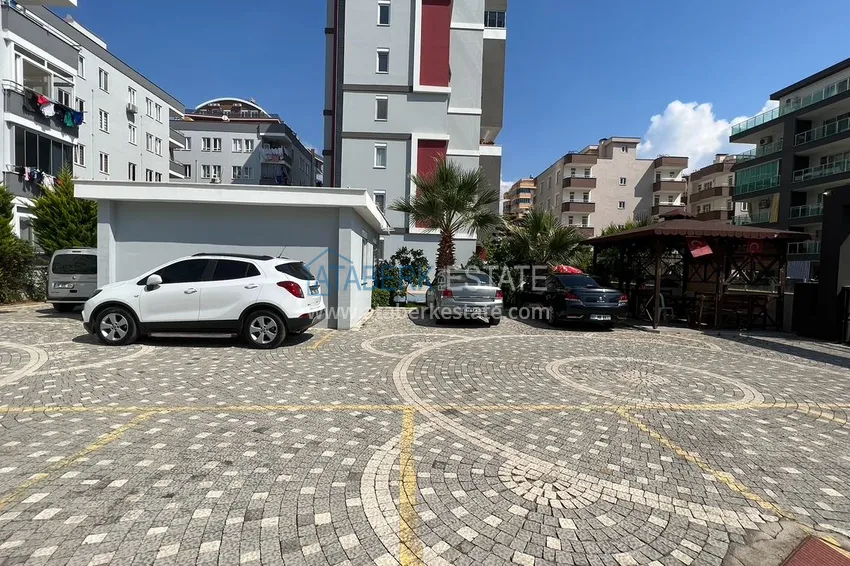 Квартира в районе Махмутлар с мебелью и отдельной кухней 6 