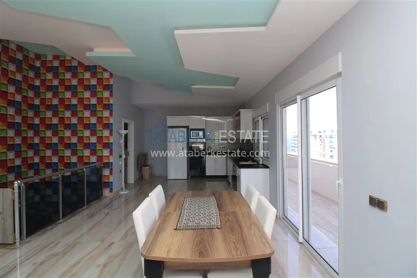 Приобрести Пентхаус в Махмутларе с мебелью, сауной и видом на море и горы 6