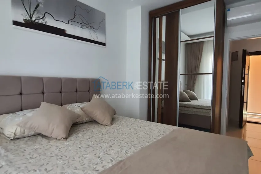 Приобрести Квартира в Махмутларе с мебелью и видом на море в резиденции отельного типа 6