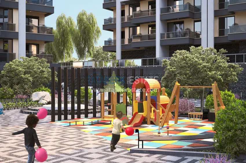 Квартира в районе Оба в жилом комплексе на этапе строительства 10 