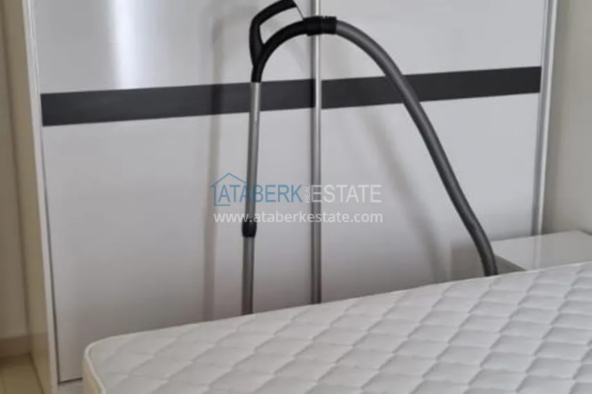 Приобрести Квартира в Махмутларе в благоустроенном жилом комплексе полностью готовая для проживанияи с мебелью с видом на море и горы 7 