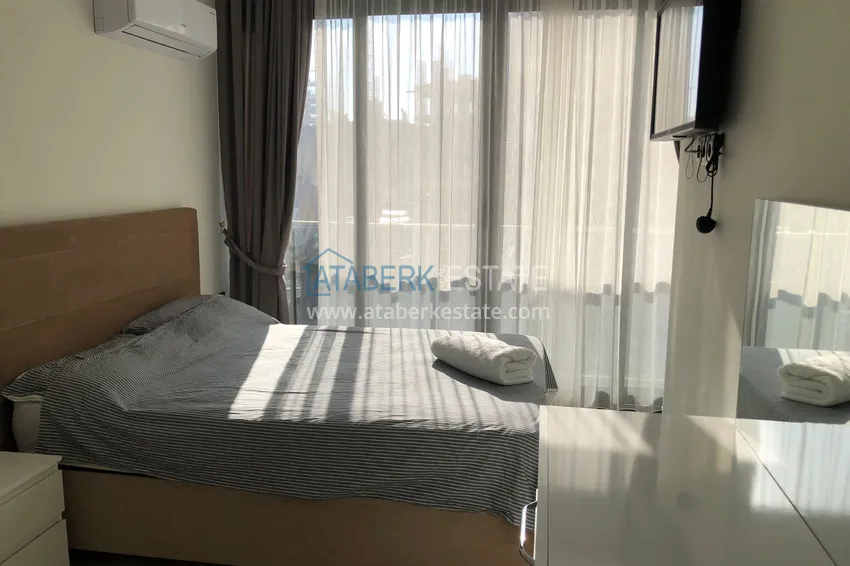 Приобрести Дуплекс в Махмутларе с боковым видом на море на первой береговой линии 7 