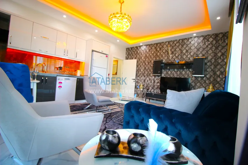 Приобрести Квартира в Махмутларе с новой мебелью в современном новом комплексе 9 