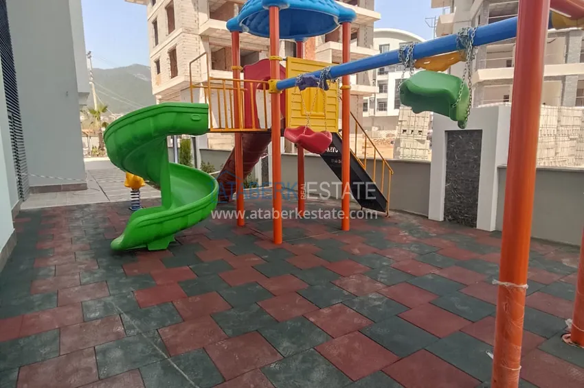 Квартира в Алании район Оба с чистовой отделкой в новостройке 7 