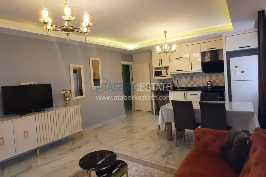 Приобрести Квартира в центре Махмутлара трехкомнатная с мебелью в бутик-комплексе  8 