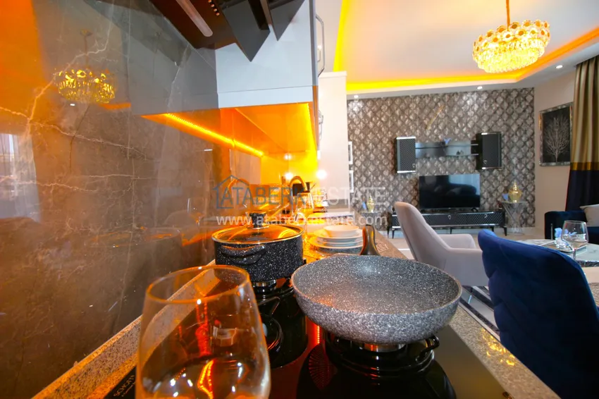 Приобрести Квартира в Махмутларе с новой мебелью в современном новом комплексе 10 