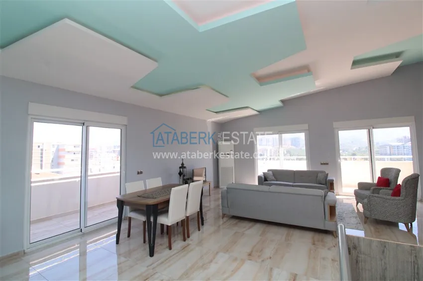 Приобрести Пентхаус в Махмутларе с мебелью, сауной и видом на море и горы 8