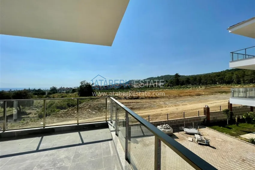 Приобрести Квартира в Алании район Инджекум с чистовой отделкой в стильной резиденции таунхаусов 9 