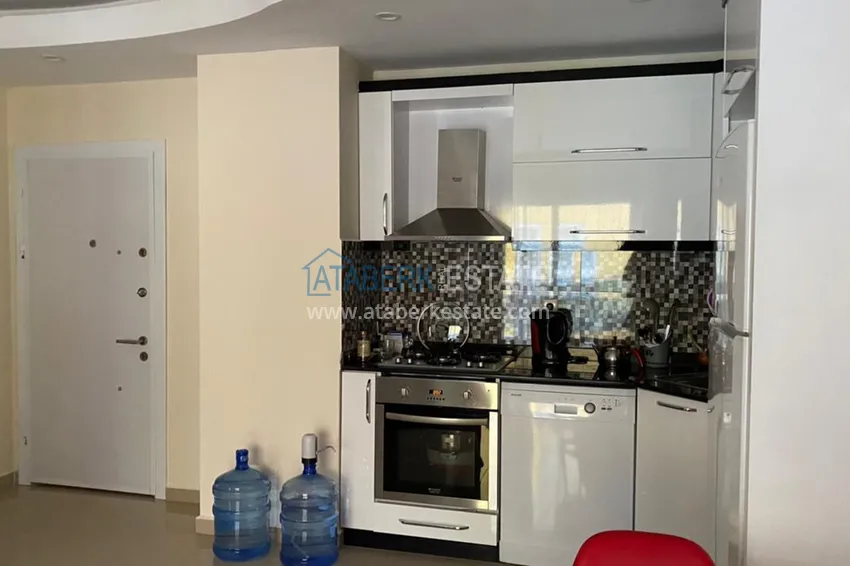 Приобрести Квартира в центре Махмутлара с мебелью в комплексе с инфраструктурой 9 