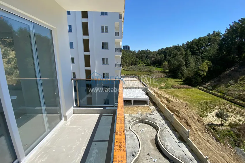 Приобрести Квартира в районе Авсаллар в новом современном комплексе 8 