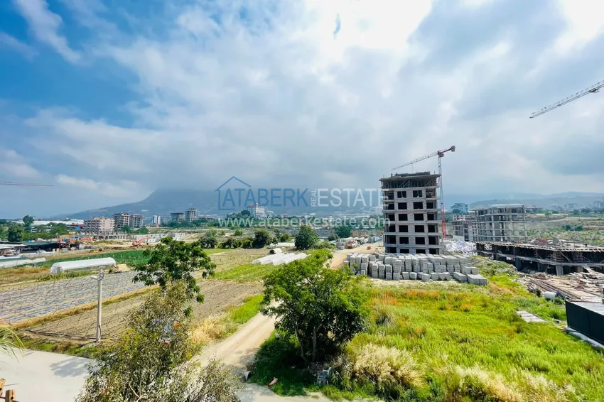 Приобрести Квартира в Махмутларе, с мебелью и видом на горы в жилом комплексе 8 