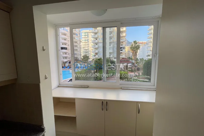 Приобрести Квартира в Махмутлар с двумя спальнями и застекленными балконами в комплексе на первой береговой 12 