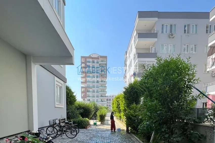 Квартира в районе Махмутлар с мебелью и отдельной кухней 9 