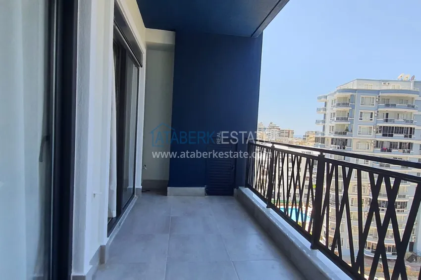 Приобрести Квартира в Махмутларе с мебелью и видом на море в резиденции отельного типа 9