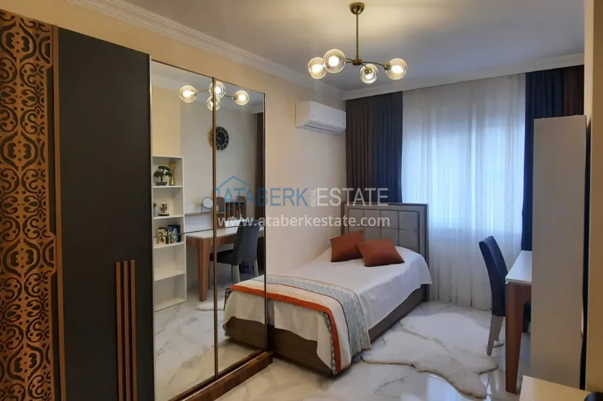 Приобрести Квартира в центре Махмутлара трехкомнатная с мебелью в бутик-комплексе  10 