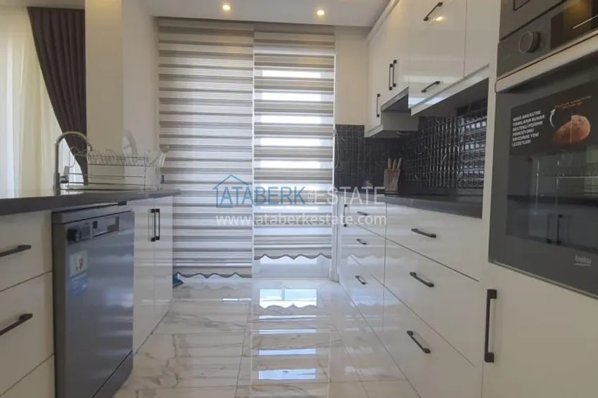 Приобрести Квартира в центре Алании - район пляжа Клеопатра, с современной мебелью и видом на горы  10 