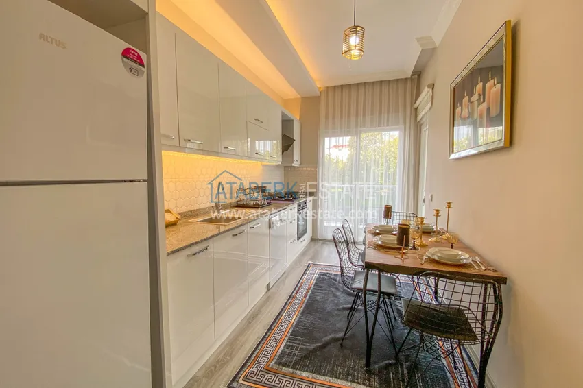 Приобрести Квартира в районе Демирташ со стильным интерьером в новостройке 9 