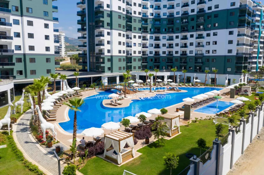 Квартиры в Махмутларе двухкомнатные полностью меблированные  1 