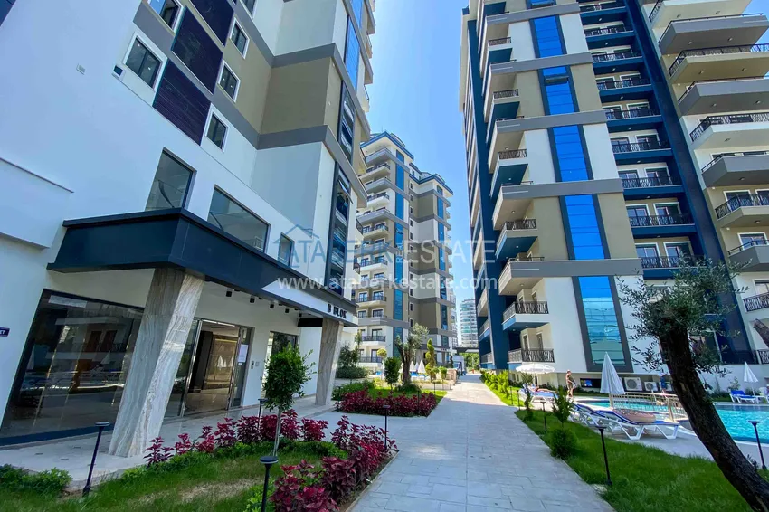 Квартира в Махмутларе с мебелью и видом на море в резиденции отельного типа 8