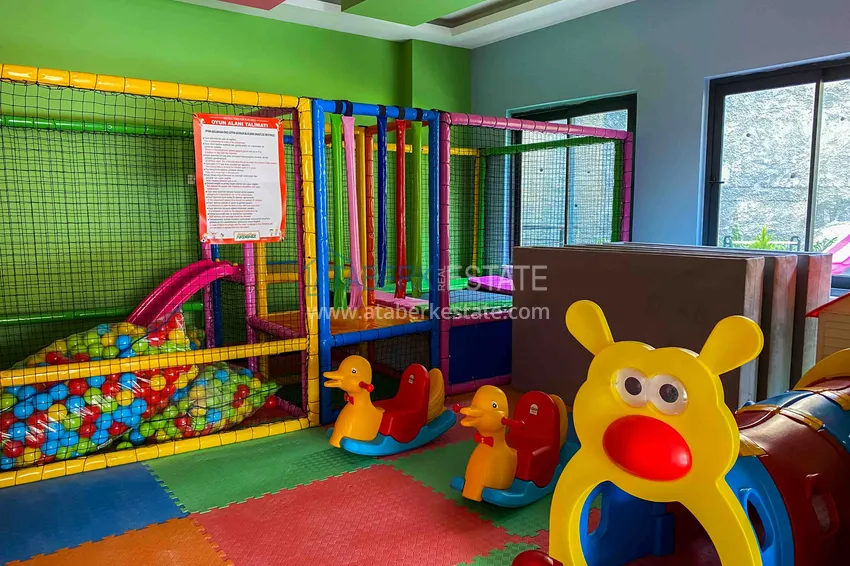 Квартира в Махмутларе с мебелью и видом на море в резиденции отельного типа 11