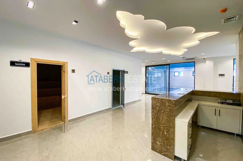 Квартира в Махмутларе с мебелью и видом на море в резиденции отельного типа 16