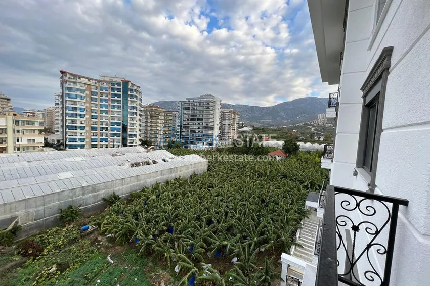 Приобрести Квартиры в Махмутларе двухкомнатные с видом на море и горы 15 