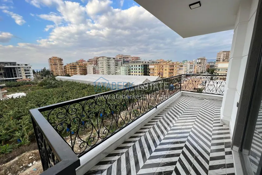 Приобрести Квартиры в Махмутларе двухкомнатные с видом на море и горы 16 