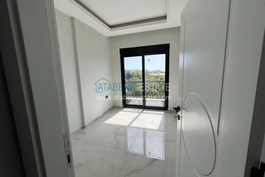 Приобрести Квартира в Алании район Оба с чистовой отделкой в новостройке 4 