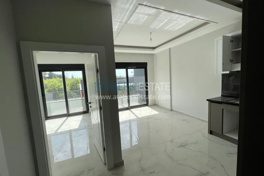 Приобрести Квартира в Алании район Оба с чистовой отделкой в новостройке 1 