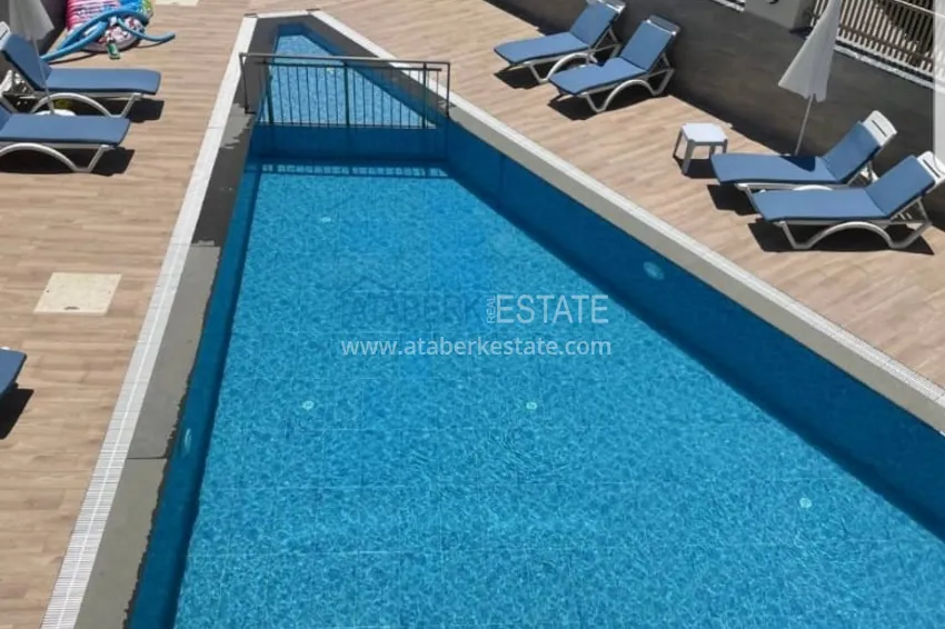 Квартира в Анталии - Хурма, четырехкомнатная в уютном жилом комплексе 1 