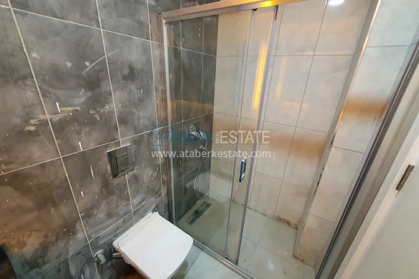 Приобрести Квартира в Махмутларе, с чистовой отделкой и видом на горы 11