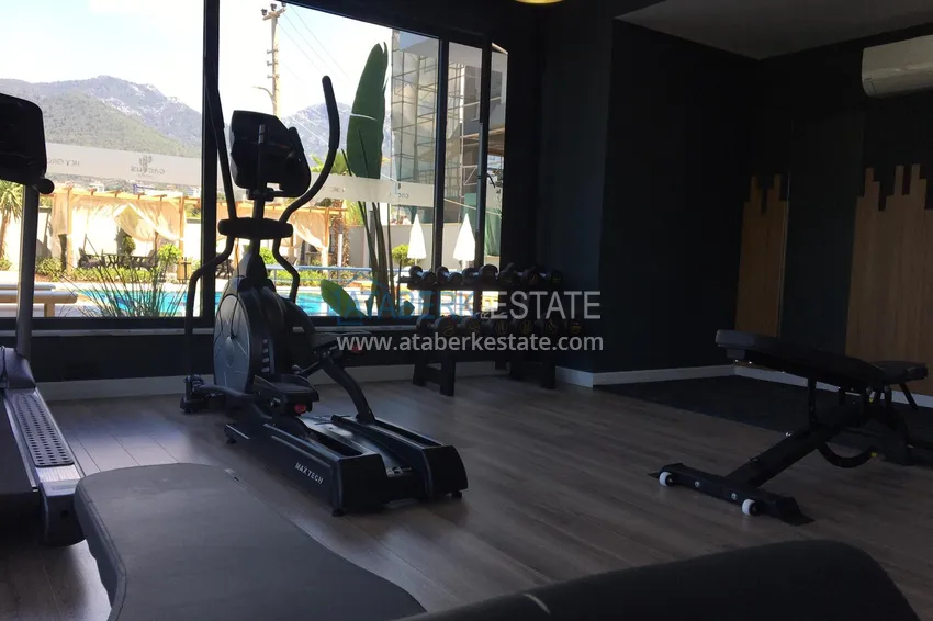 Квартира в Алании район Оба двухкомнатная в новостройке 10 