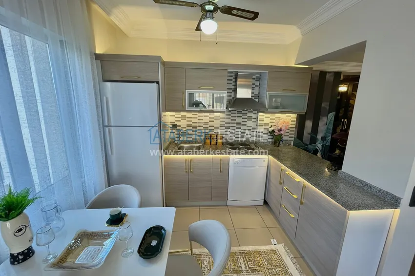 Приобрести Квартиры в районе Оба с новой мебелью и дизайнерским ремонтом в уютном жилом комплексе 10 