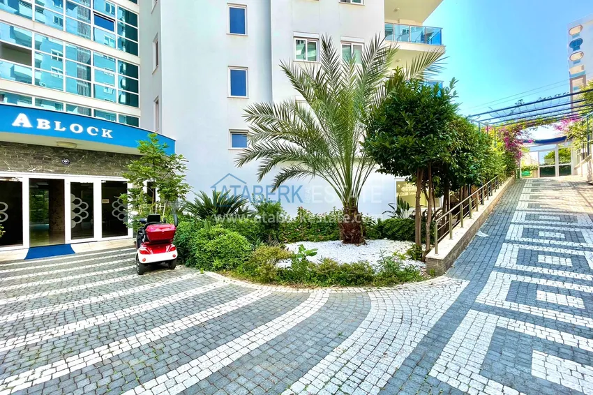 Квартира в Махмутларе с мебелью и частичным видом на море и горы 12