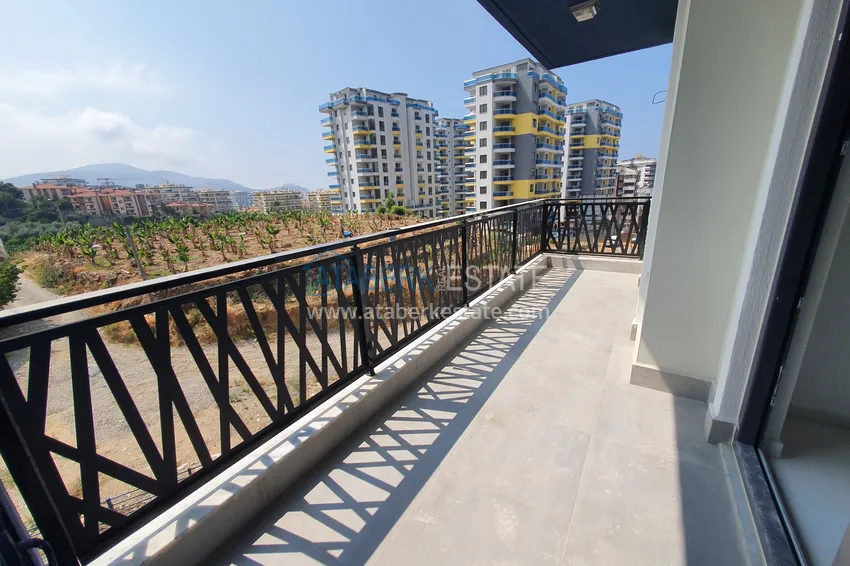 Приобрести Квартира в Махмутларе, с чистовой отделкой и видом на горы 12