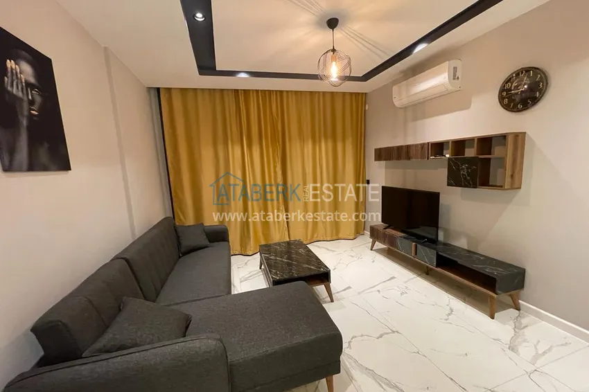 Приобрести В центре Алании на долгосрочную аренду сдаётся двухкомнатная квартира. Максимум 3 человека А1 12