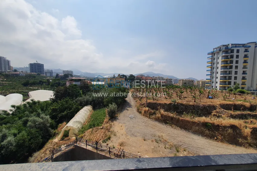 Приобрести Квартира в Махмутларе, с чистовой отделкой и видом на горы 13