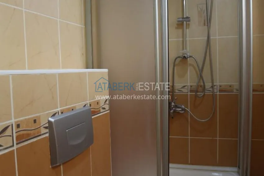 Приобрести Квартира в центре Алании с мебелью в жилом доме городского типа 11 