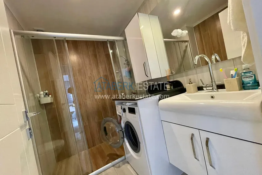 Приобрести Квартира в Махмутларе с мебелью и частичным видом на море и горы 13