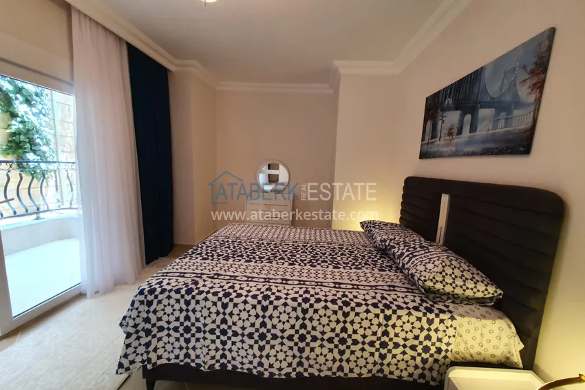 Приобрести Квартира с выходом в сад в Махмутларе трехкомнатная с новой мебелью 14 