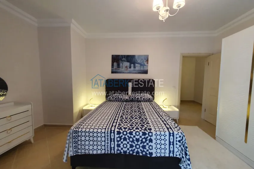 Приобрести Квартира с выходом в сад в Махмутларе трехкомнатная с новой мебелью 15 