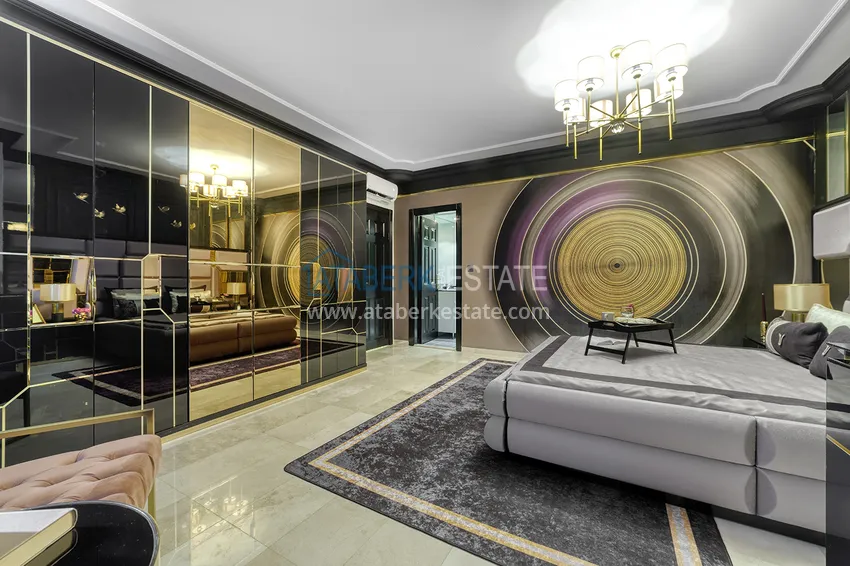 Приобрести Квартира в Махмутларе с оригинальным дизайнерским интерьером и прямым видом на море 16