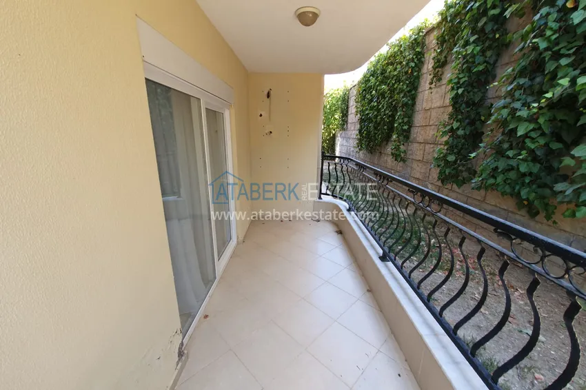 Приобрести Квартира с выходом в сад в Махмутларе трехкомнатная с новой мебелью 17 