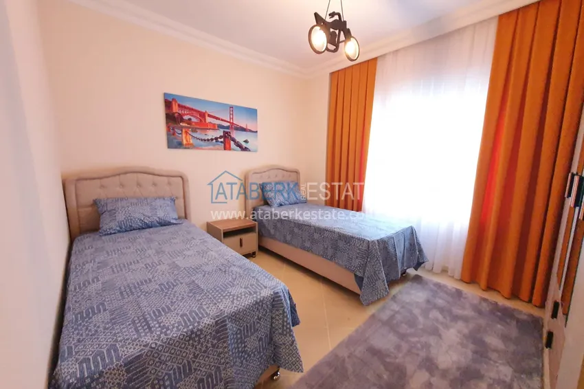 Приобрести Квартира с выходом в сад в Махмутларе трехкомнатная с новой мебелью 18 